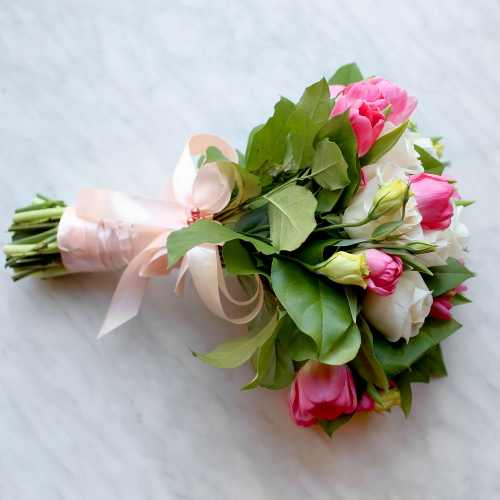 Bridal bouquet with a mix of roses. Beautiful bridal bouquet of pink and white roses.