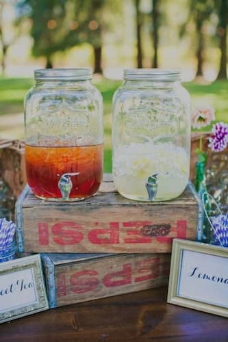 Guests will be Pleased as Punch! Sweet Tea and Lemonade in Beverage dispensers placed on crates.