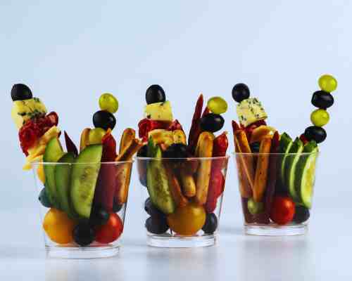 Stylish And Delicious Charcuterie Cups: Make Serving Creative And Convenient Personal charcuterie cups for parties with assorted snacks and appetizers.