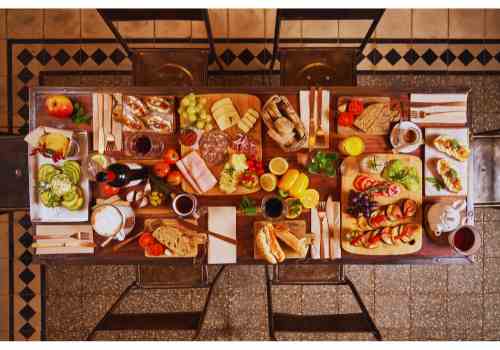 Charcuterie Board Dinner Party: Make It Unforgettable! Beautifully arranged charcuterie boards for a dinner party.