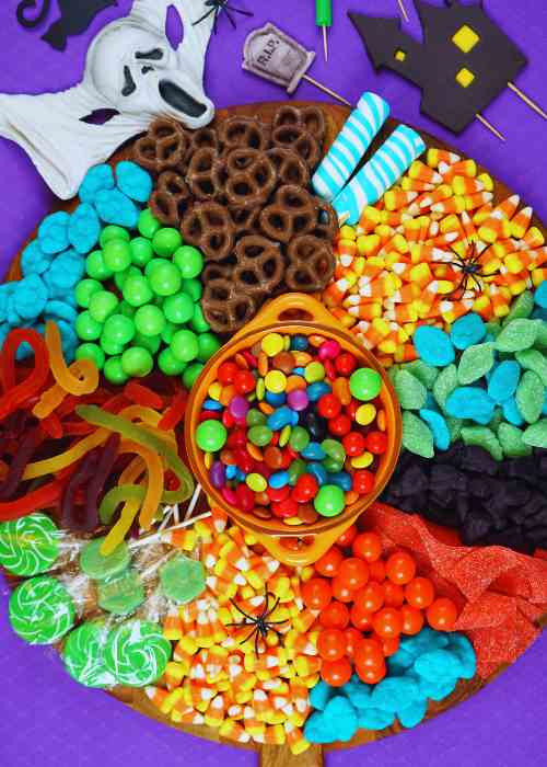 Halloween Candy Charcuterie Board: Trick Or Treat Halloween candy charcuterie board featuring a variety of Halloween treats.