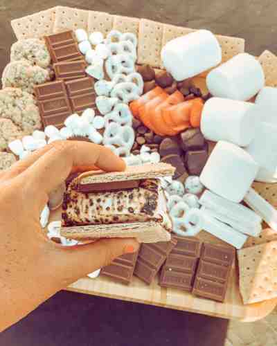 Create a Kid-Friendly Charcuterie Board With S'mores Essentials Kid-friendly charcuterie board with everything needed to make s'mores.