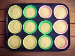 Cupcake pan filled with batter.