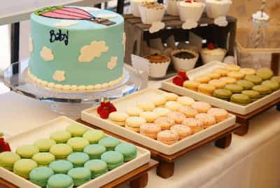 Try this table display at your next baby shower:  What a sweet idea! Sweets table display for baby shower.