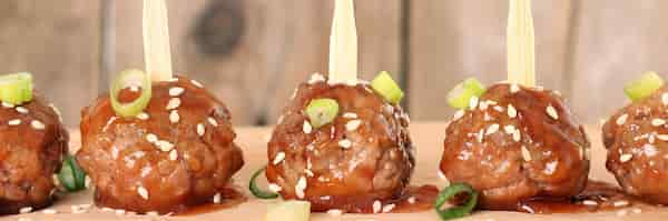 Crockpot Meatballs are so easy and so tasty! Meatballs cooked in a sauce.