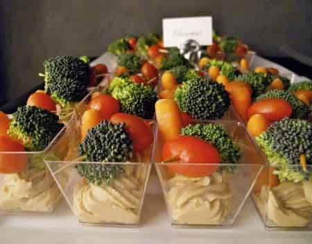 Party foods to make celebrating easier. Serve appetizer cups of colorful vegetables with your party foods.
