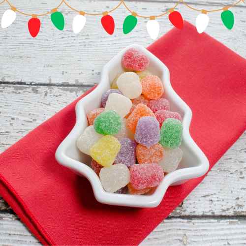We Wish You A Candy Christmas Christmas tree dish filled with candy.