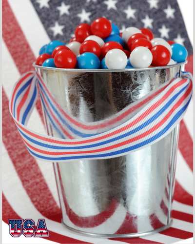 Let Freedom Ring Tin bucket filled with red, white, and blue gumballs.